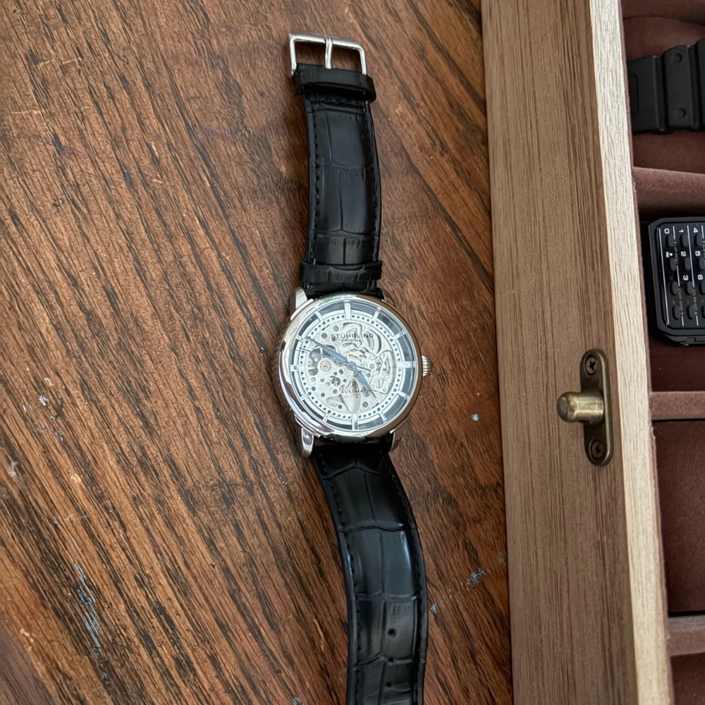 Silver Skeleton Watch with Black Leather Strap